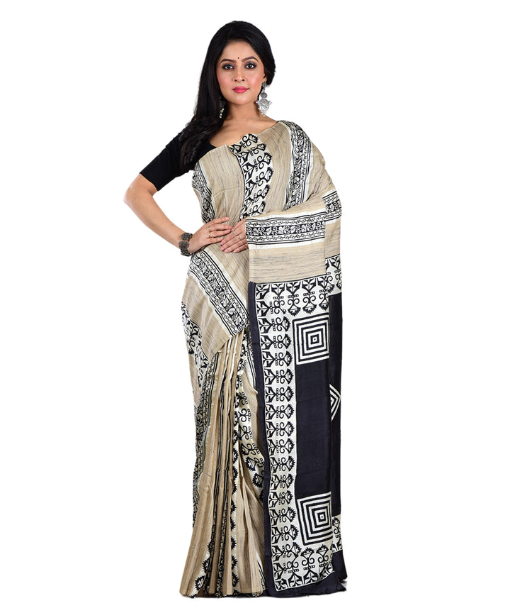 Beige black hand printed silk saree