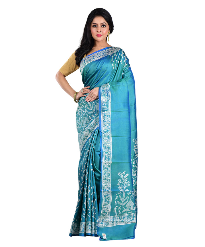 Teal green hand printed silk saree