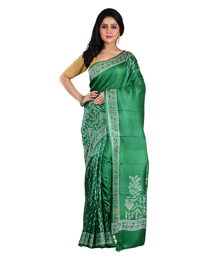 Dark green hand printed silk saree