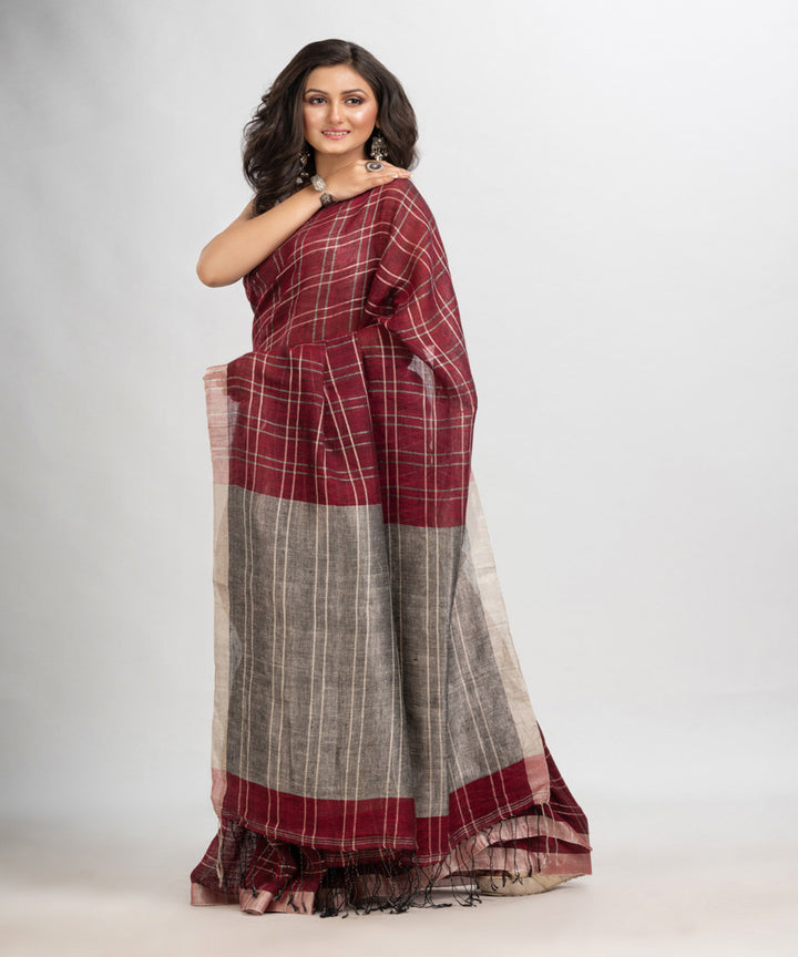 Maroon handloom linen with silver zari bengal saree