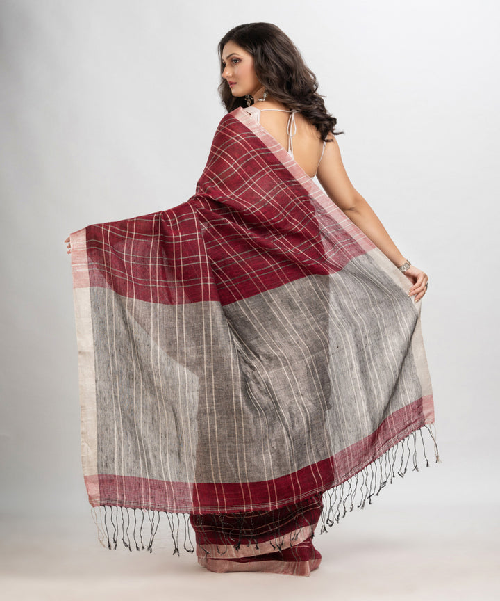 Maroon handloom linen with silver zari bengal saree