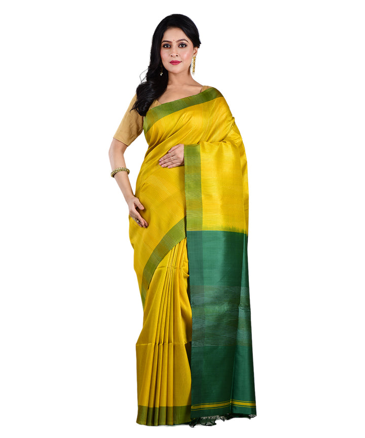 Yellow dark green handwoven silk saree