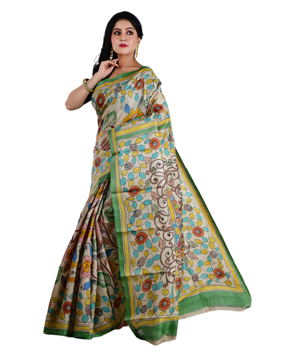 Beige multicolor hand printed tussar silk saree