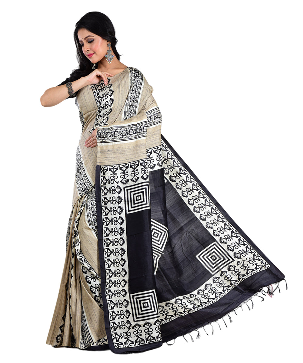 Beige black hand printed silk saree