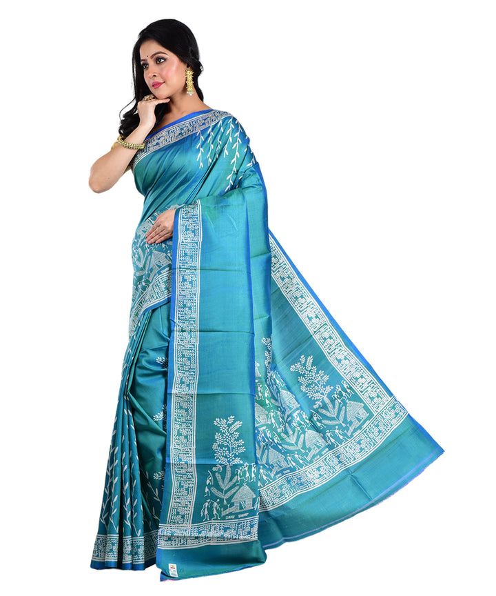 Teal green hand printed silk saree