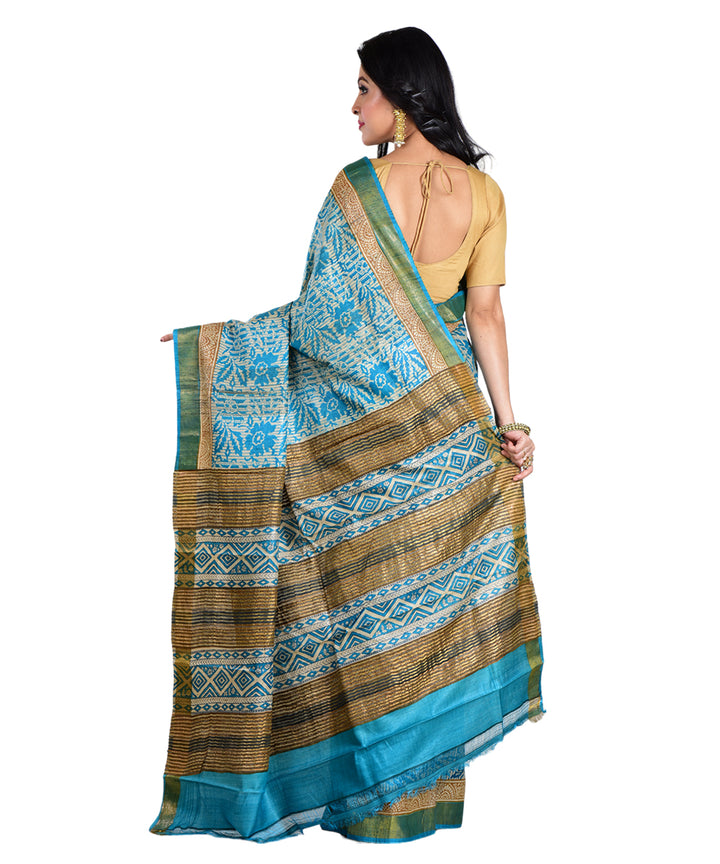 Sky blue beige hand printed tussar silk saree