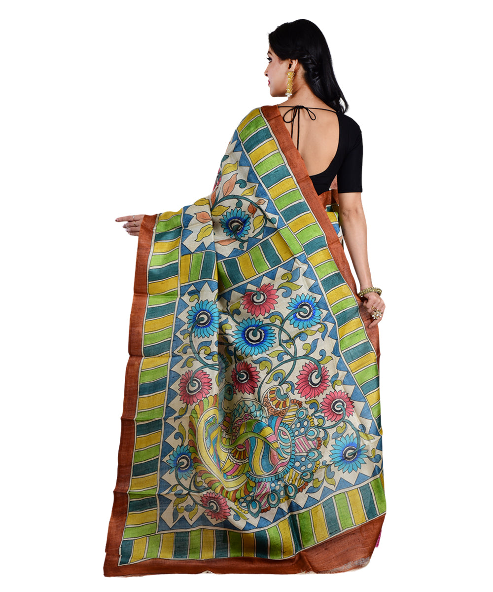 Beige multicolor tussar silk hand printed saree