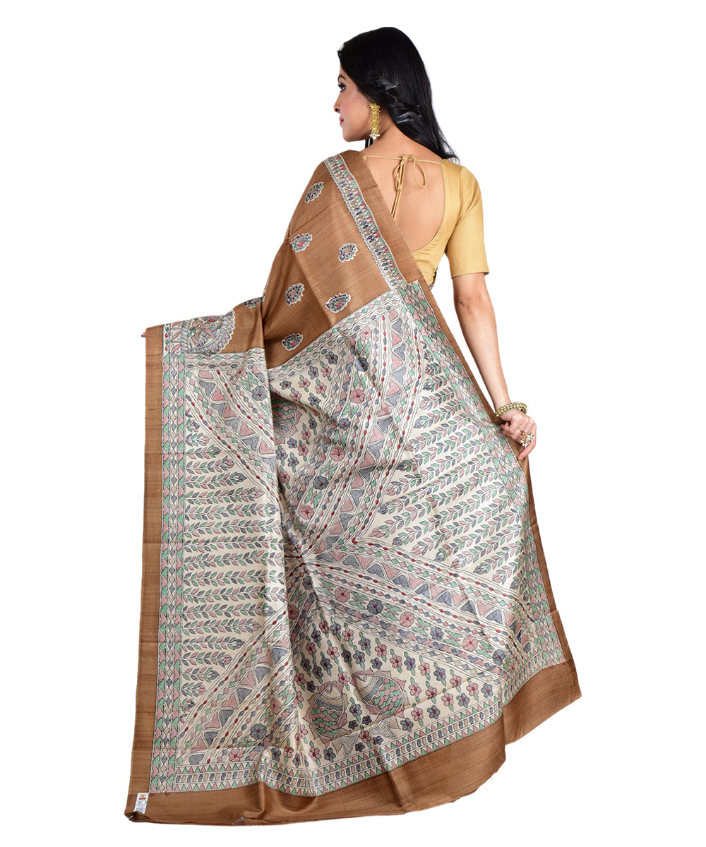 Brown multicolor hand printed tussar silk saree