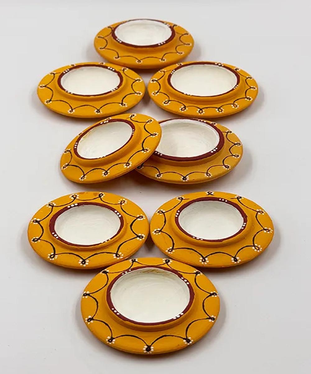 Yellow handcrafted decor terracotta disc diya- Set of 8