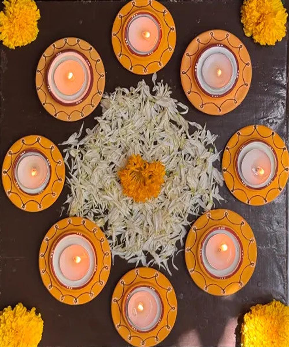 Yellow handcrafted decor terracotta disc diya- Set of 8