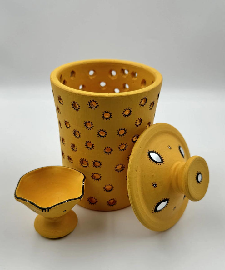 Yellow handcrafted decor terracotta jar diya