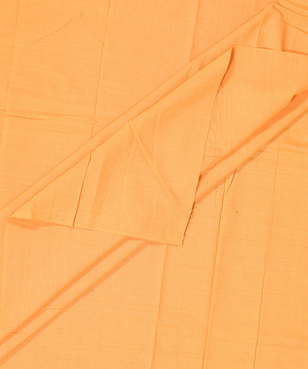Amber yellow plain handwoven cotton fabric
