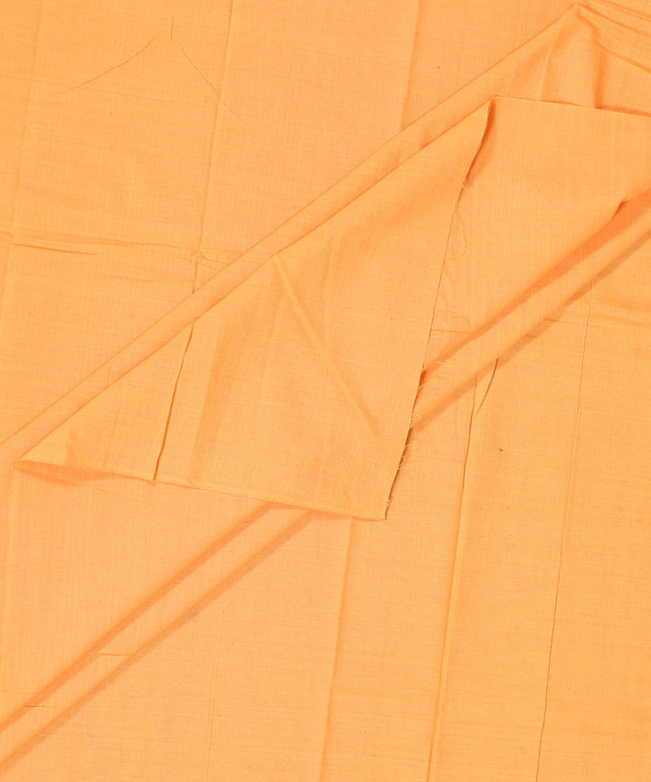 Amber yellow plain handwoven cotton fabric