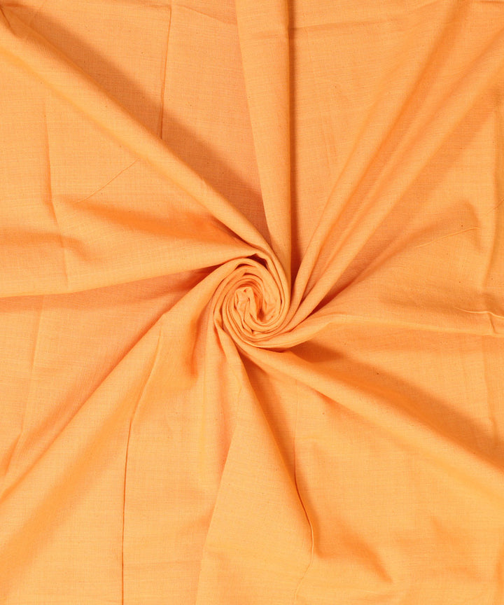 Amber yellow plain handwoven cotton fabric