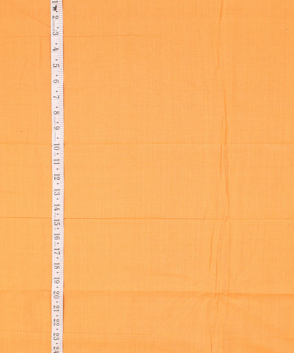Amber yellow plain handwoven cotton fabric