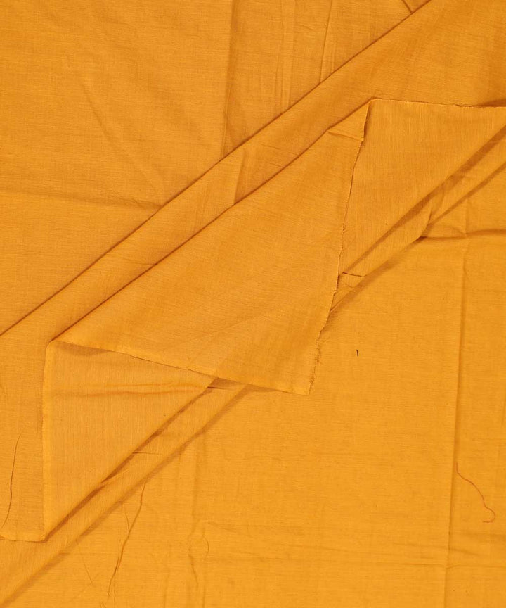 Ochre brown plain handwoven cotton fabric