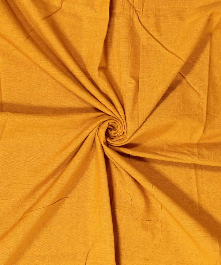 Ochre brown plain handwoven cotton fabric