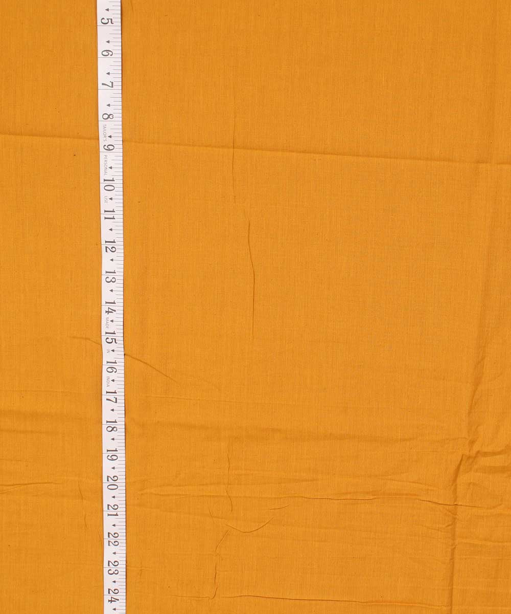 Ochre brown plain handwoven cotton fabric