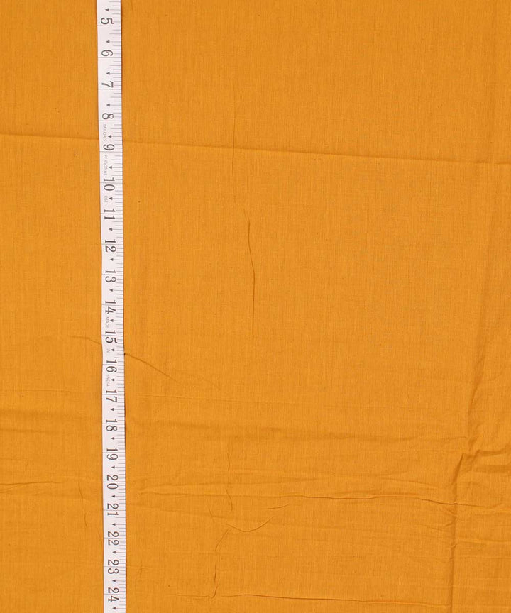 Ochre brown plain handwoven cotton fabric