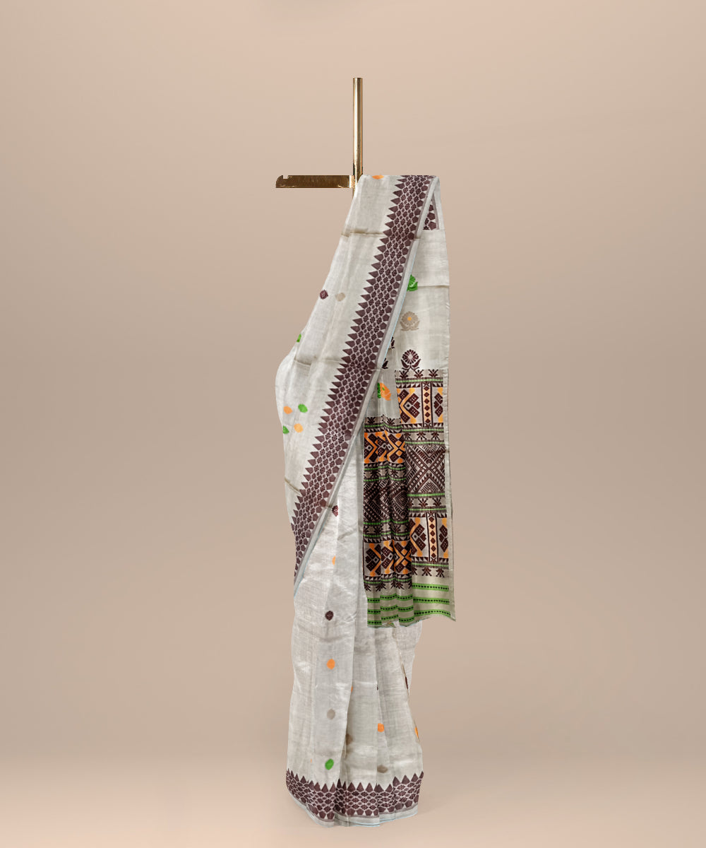 Cream multicolour assam tussar silk handloom saree