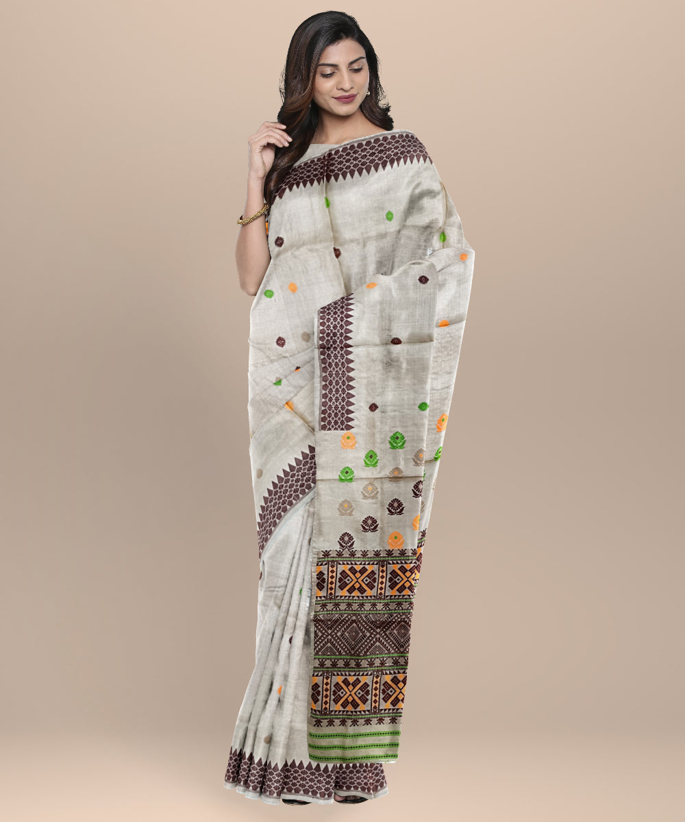 Cream multicolour assam tussar silk handloom saree