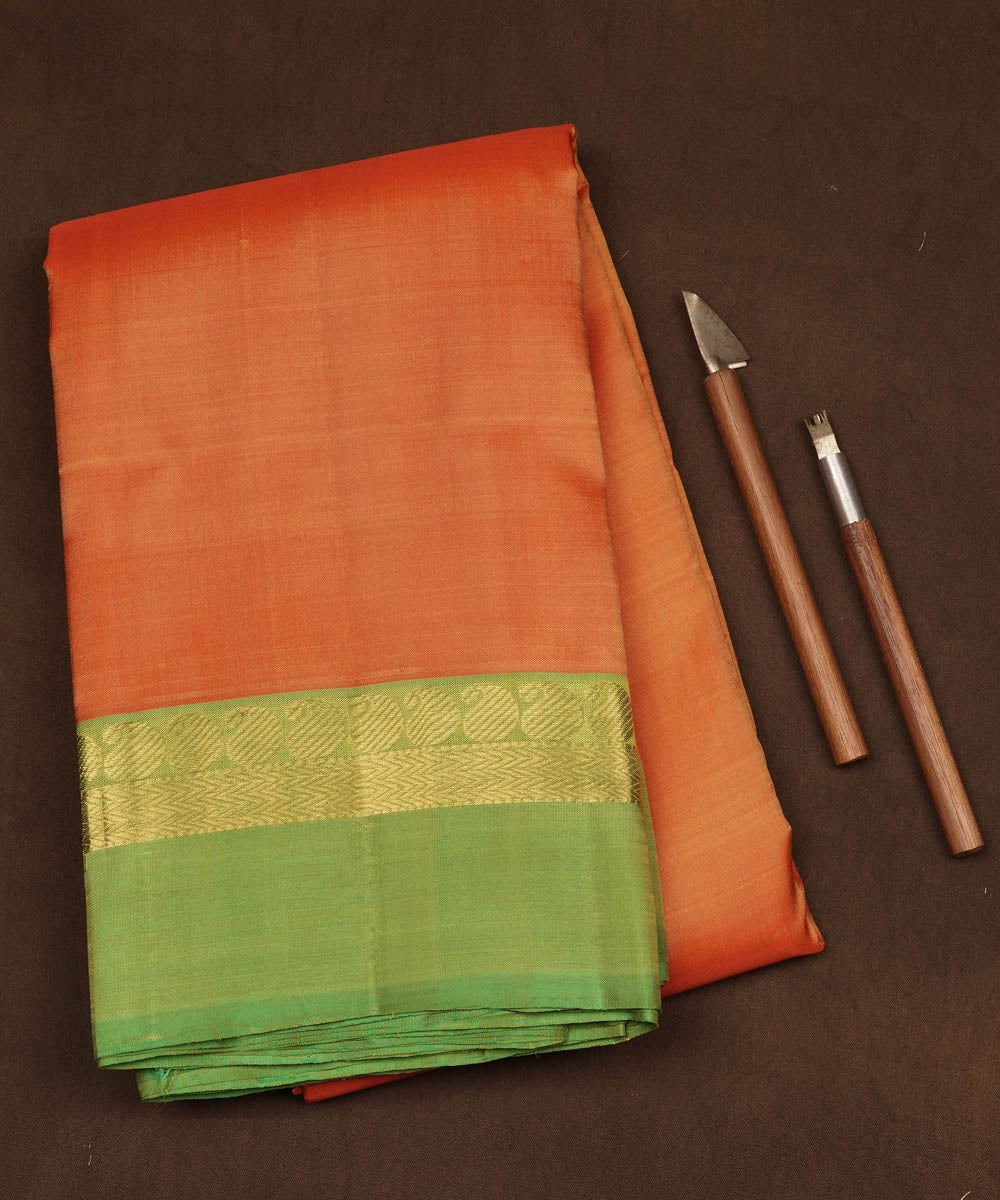 Handwoven orange with green kanjivaram silk saree