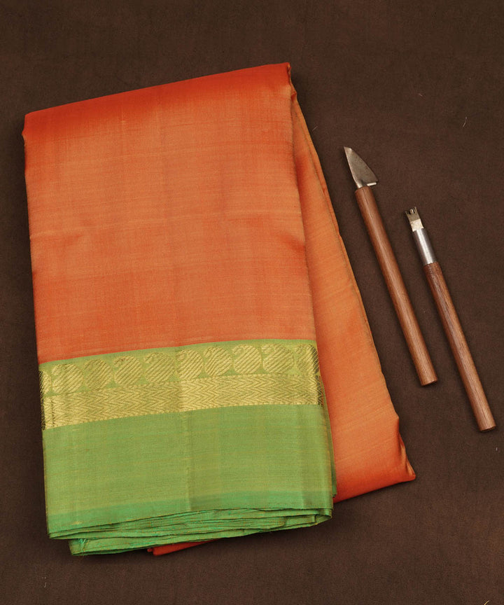 Handwoven orange with green kanjivaram silk saree