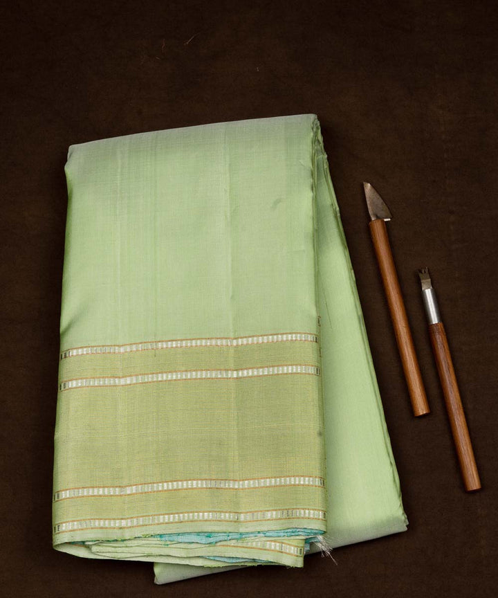 Handwoven green with aqua blue kanjivaram silk saree