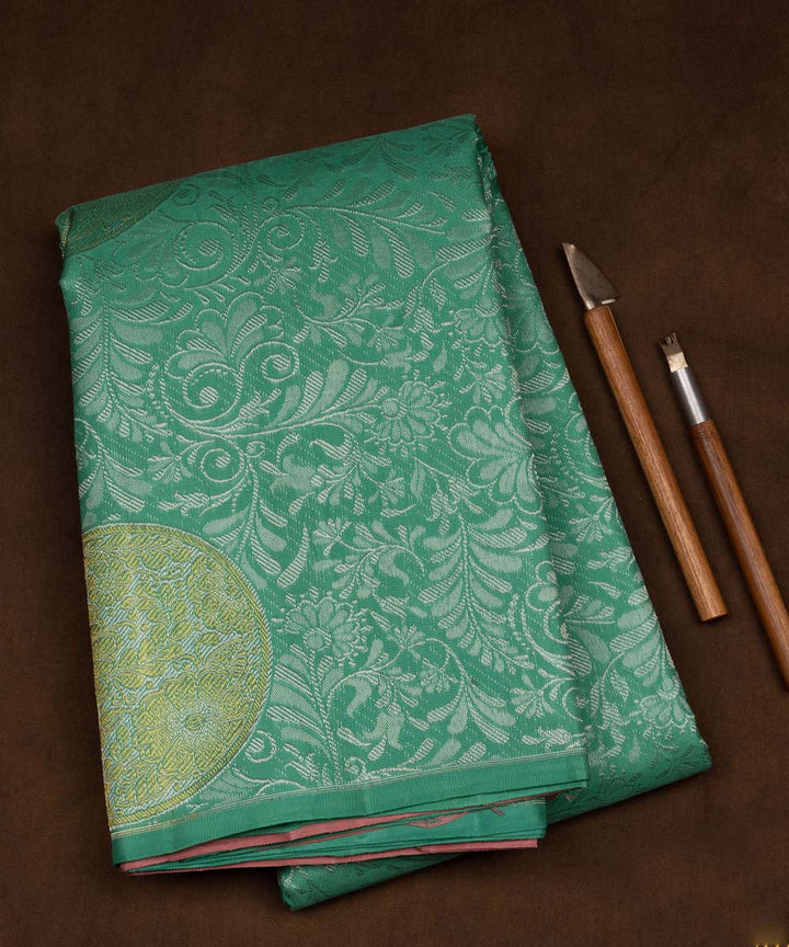 Handwoven green with pink kanjivaram silk saree