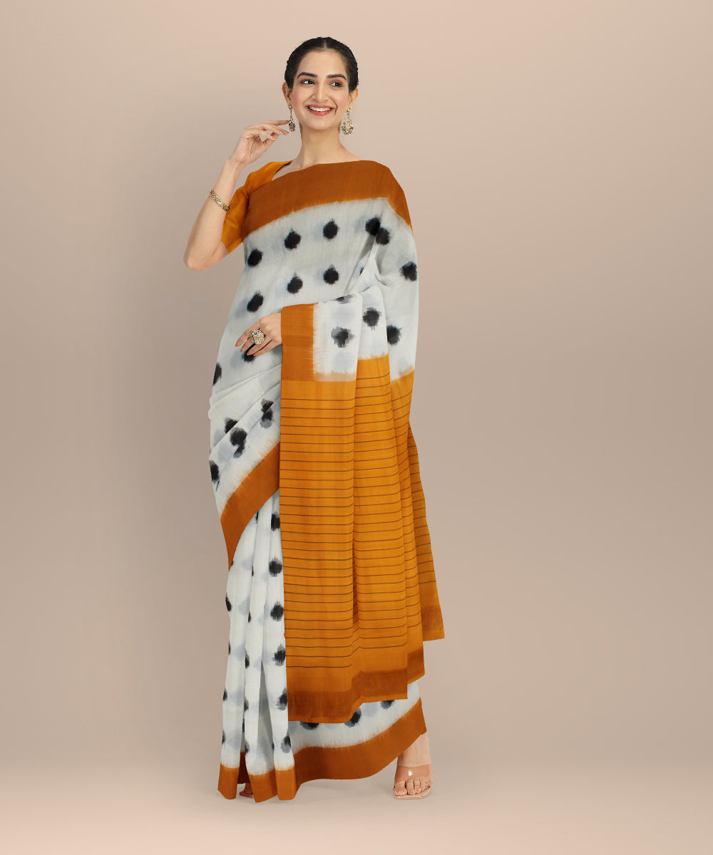 White yellow teliarumal cotton handloom pochampally ikat saree