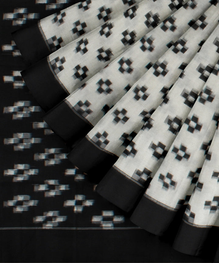 White black teliarumal cotton handloom pochampally ikat saree