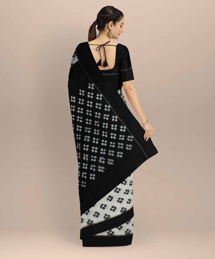 White black teliarumal cotton handloom pochampally ikat saree