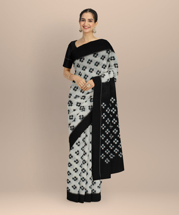 White black teliarumal cotton handloom pochampally ikat saree
