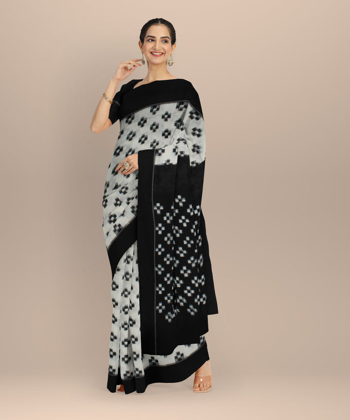 White black teliarumal cotton handloom pochampally ikat saree