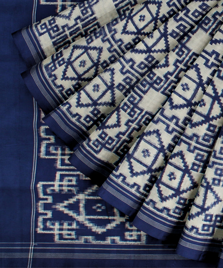 White navy blue teliarumal cotton handloom pochampally ikat saree