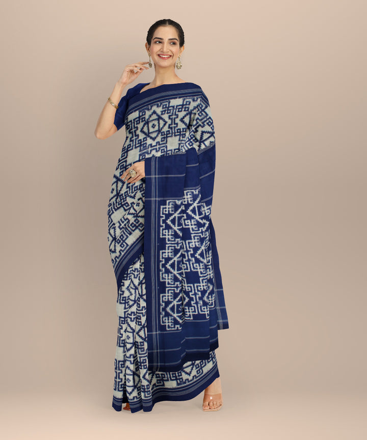 White navy blue teliarumal cotton handloom pochampally ikat saree