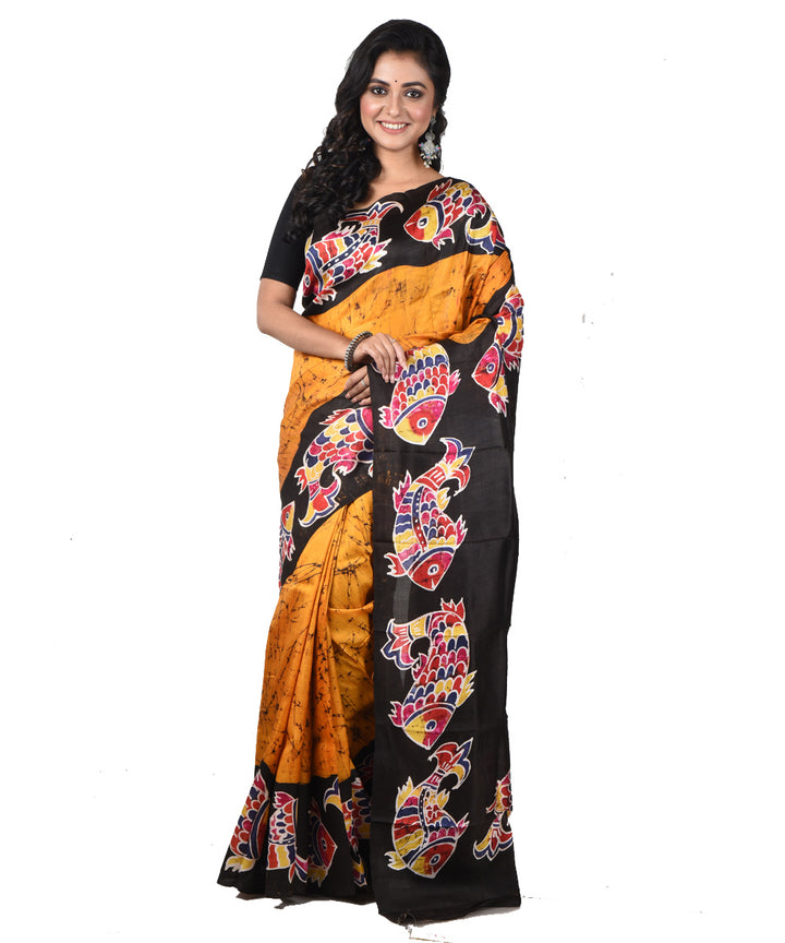 Brown offwhite silk hand printed batik print saree