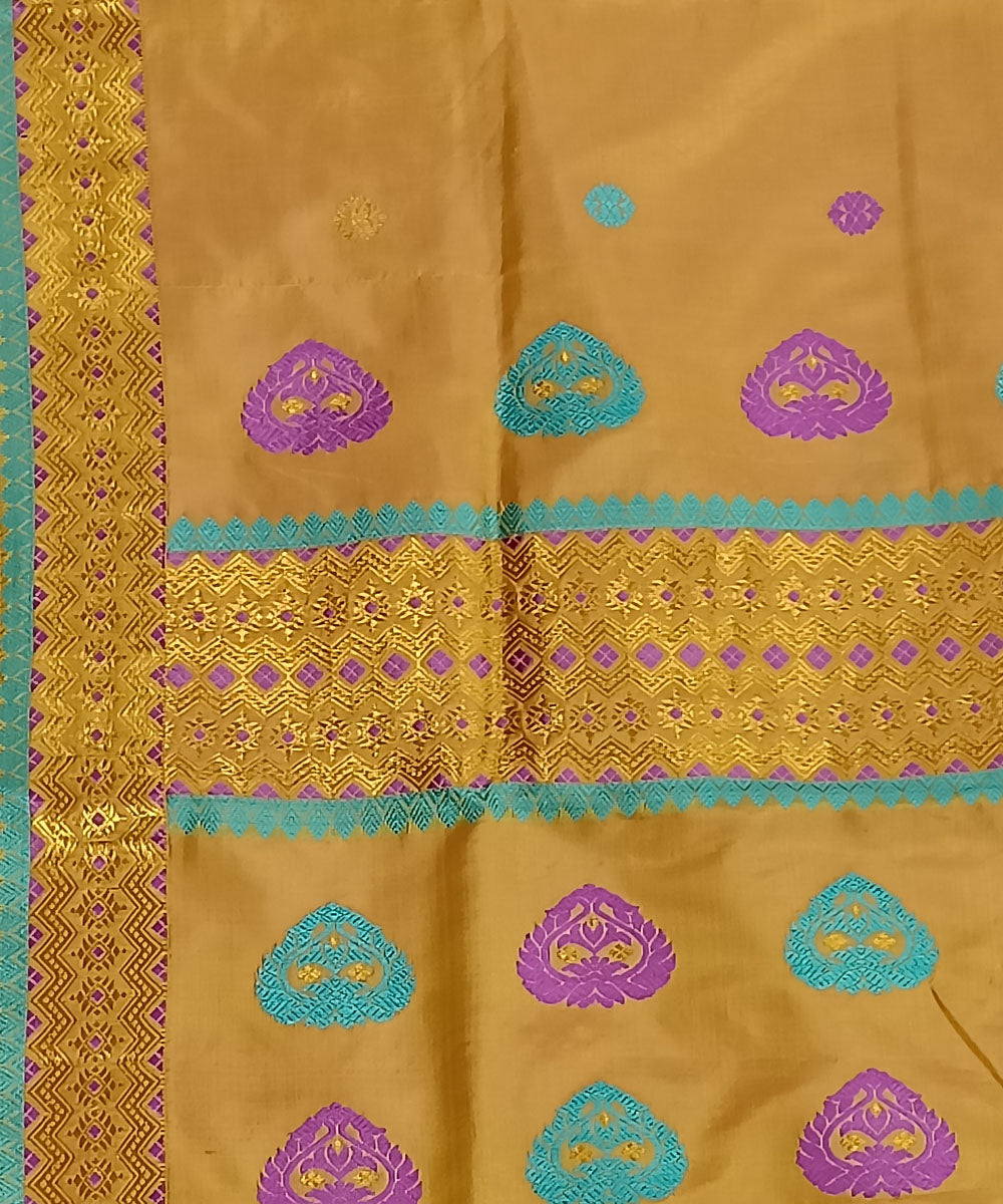 Ochre yellow silk handwoven assam saree
