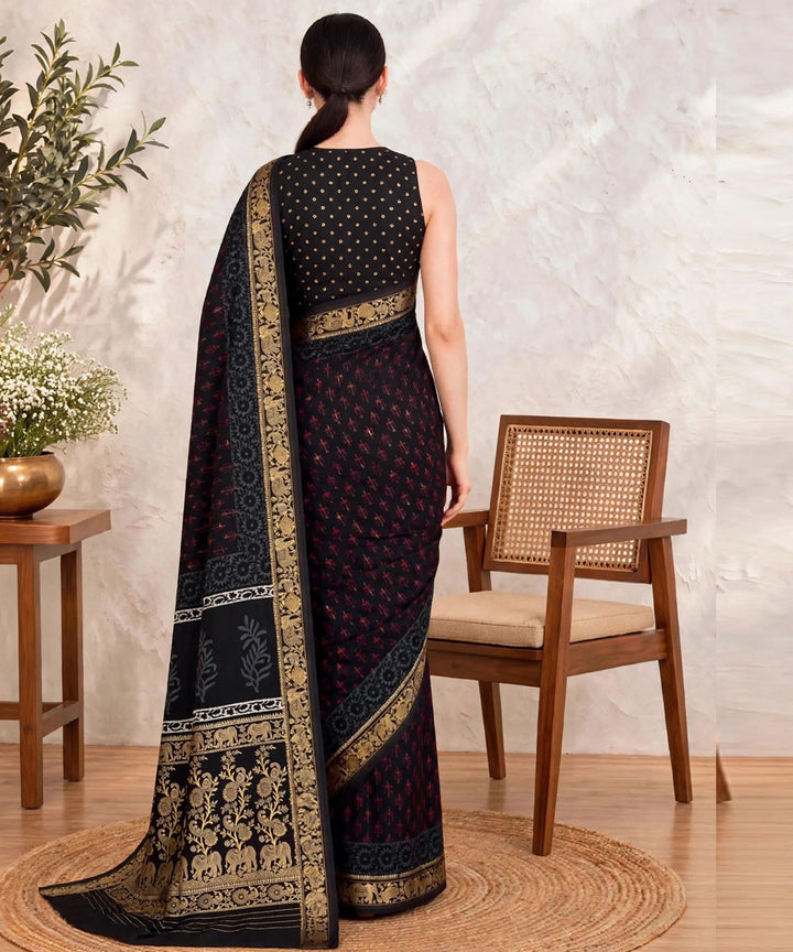 Black golden hand printed bagru print silk saree