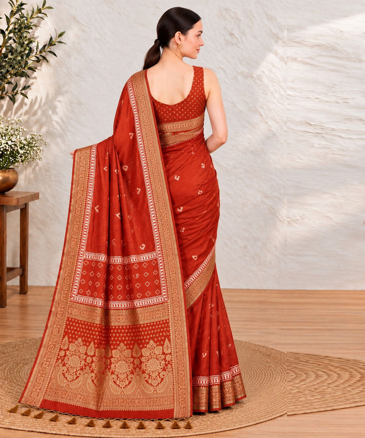 Orange golden hand printed bagru print silk saree