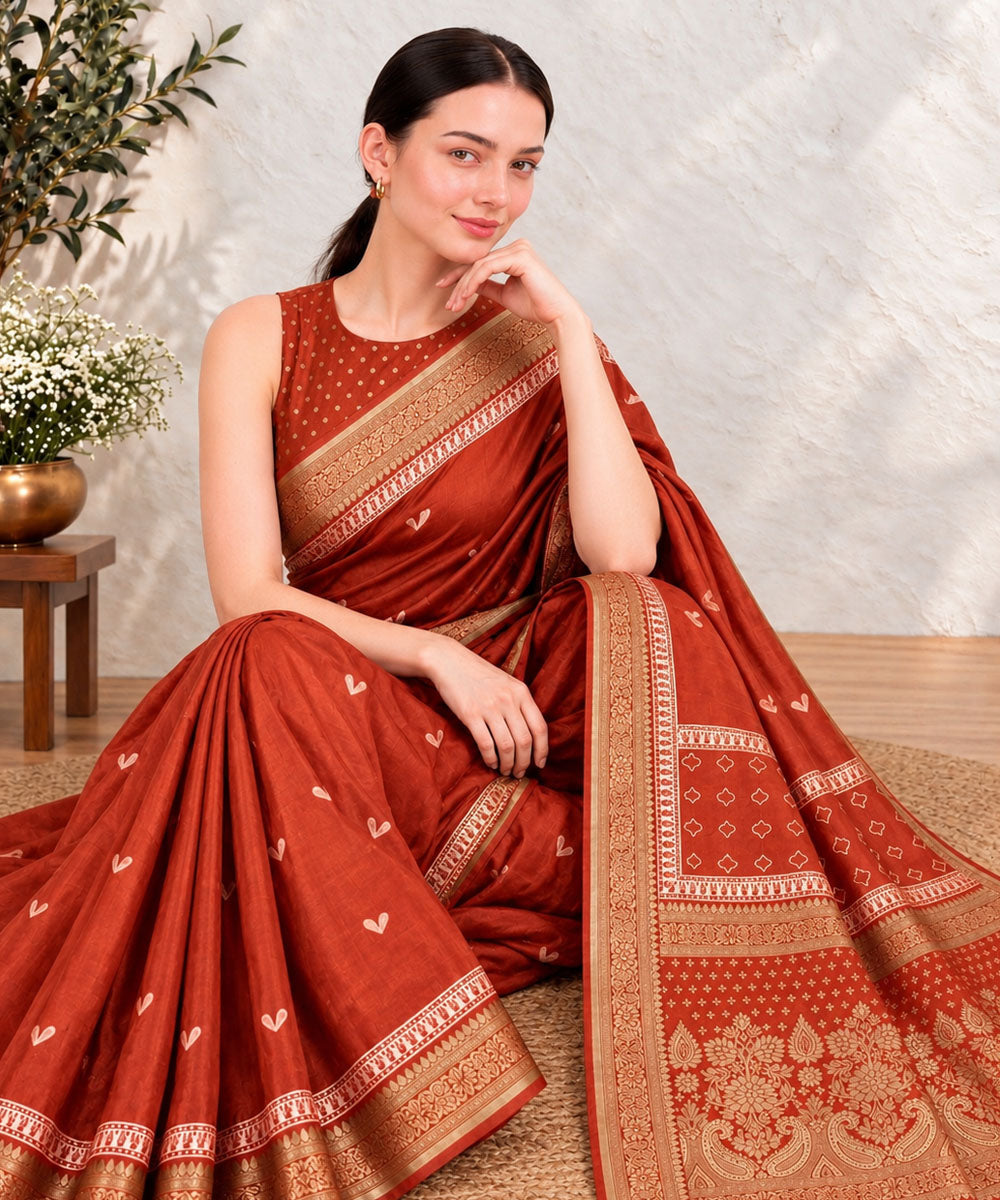 Orange golden hand printed bagru print silk saree
