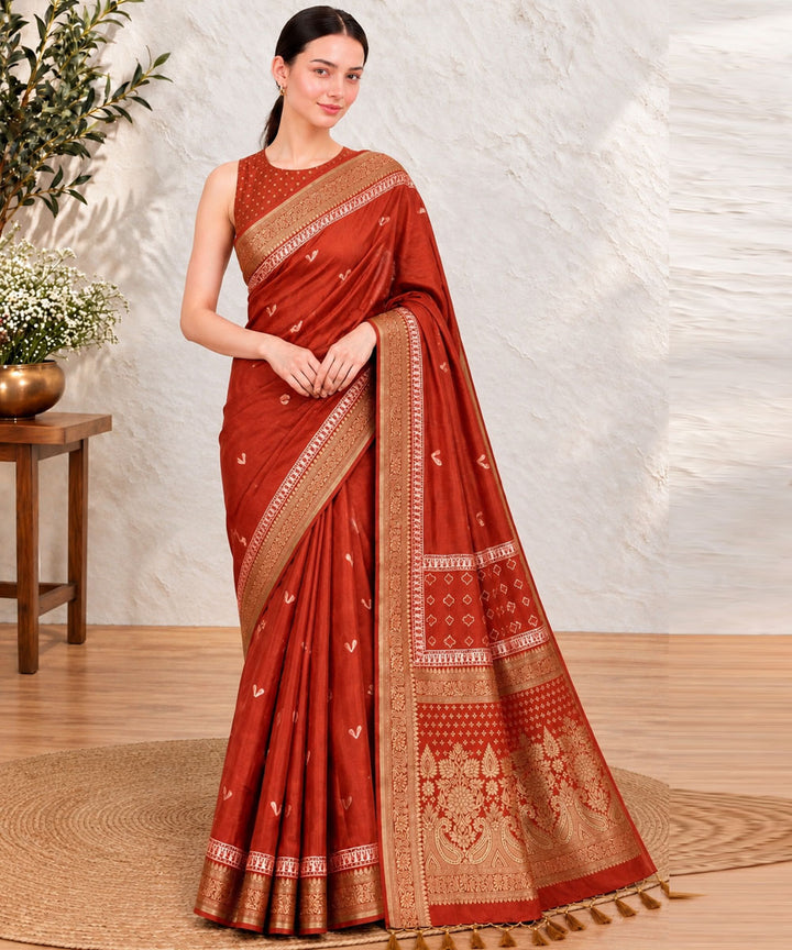 Orange golden hand printed bagru print silk saree