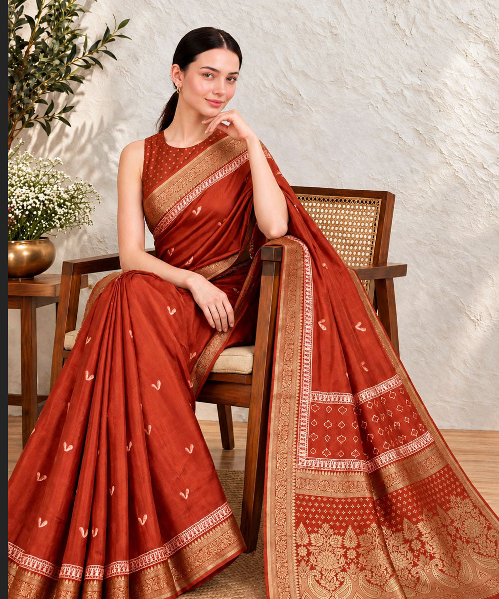Orange golden hand printed bagru print silk saree