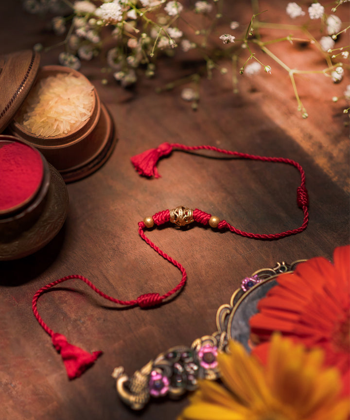 Hand crafted dokhra rakhi with mercerised cotton thread