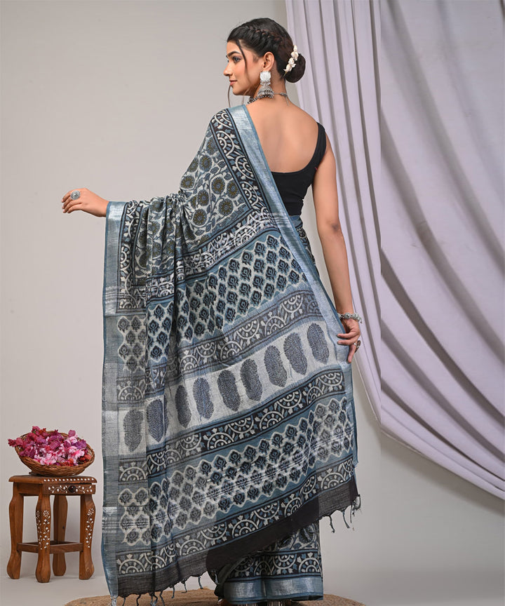 Cyan blue menka linen hand printed ajrakh saree