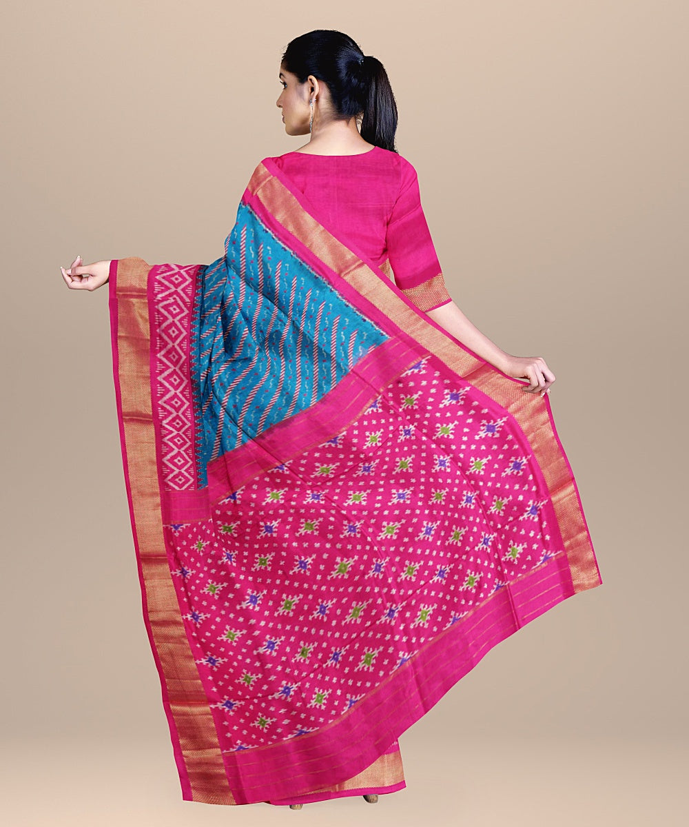 Dark green pink handwoven pochampally ikat silk saree