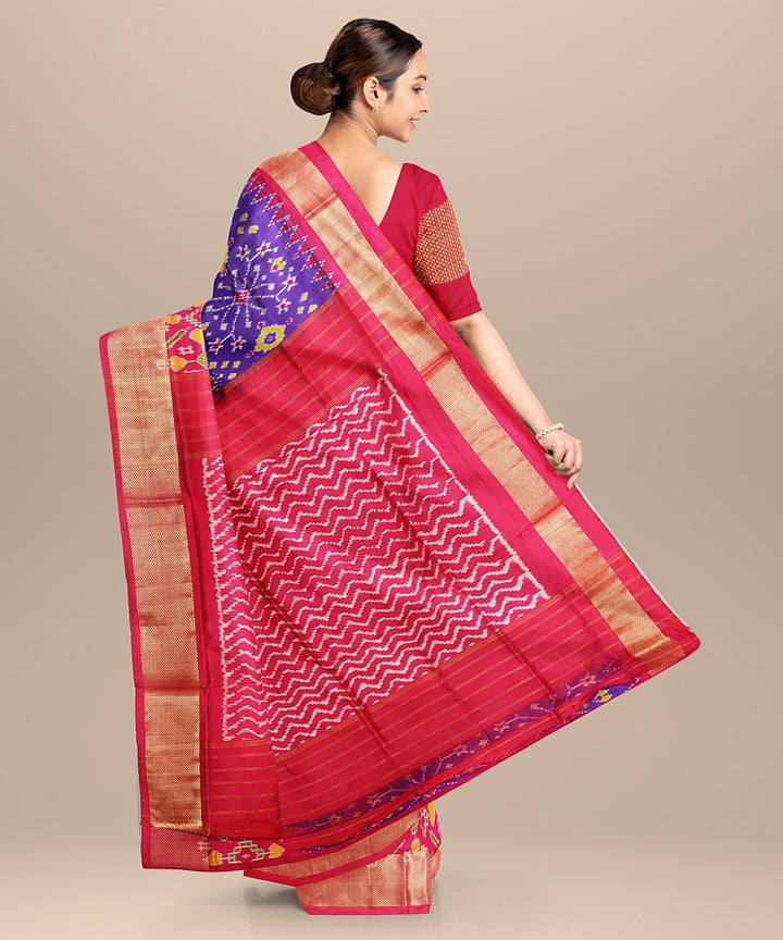 Deep blue pink handwoven pochampally ikat silk saree