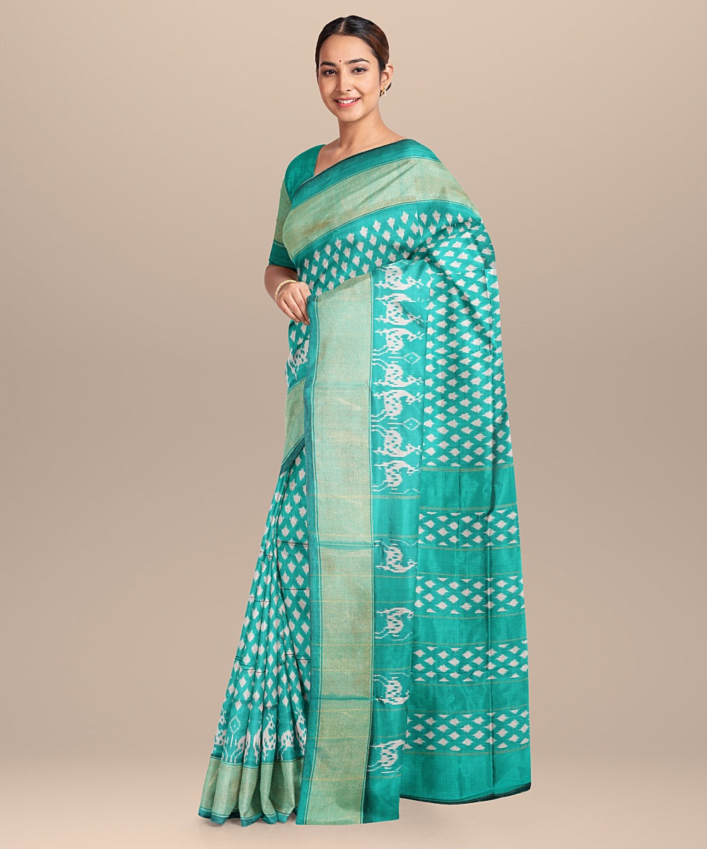 Sea green handwoven silk pochampally ikat saree