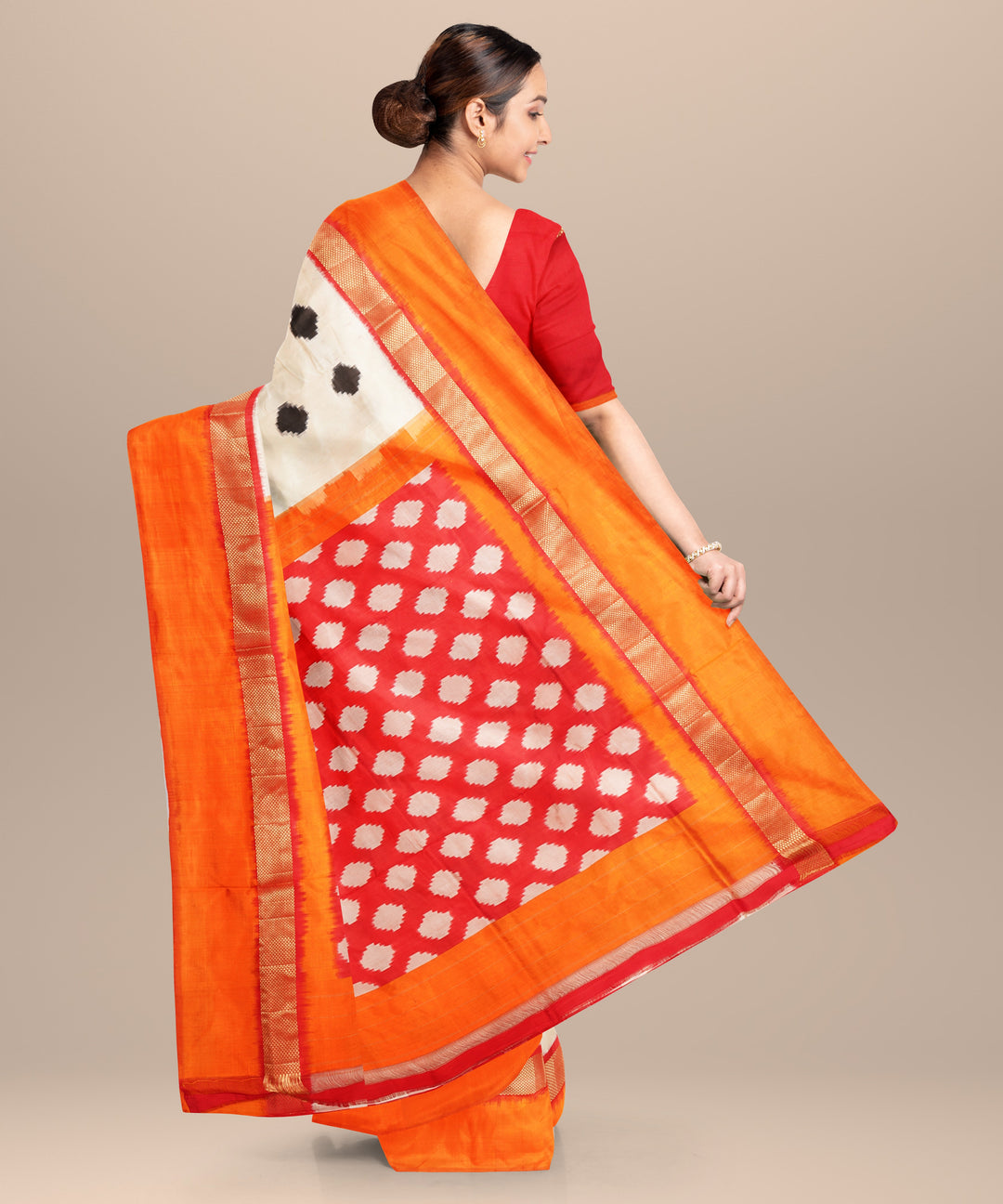 Offwhite orange handwoven pochampally ikat silk saree