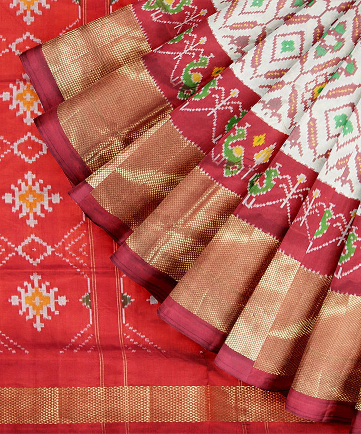 Cream red handwoven pochampally ikat silk saree